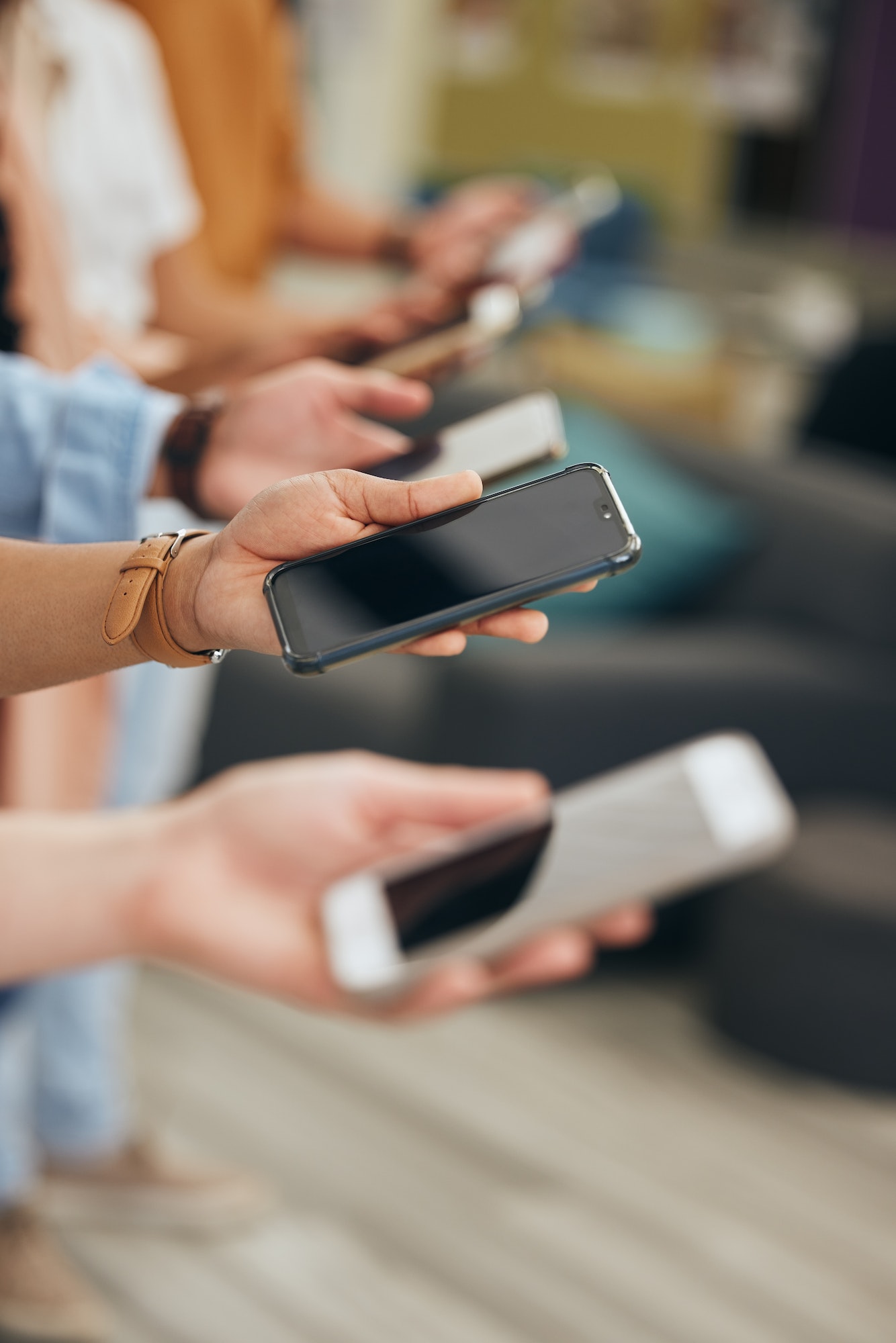 Social media and hands of people with smartphone for internet app communication side view. Row of y